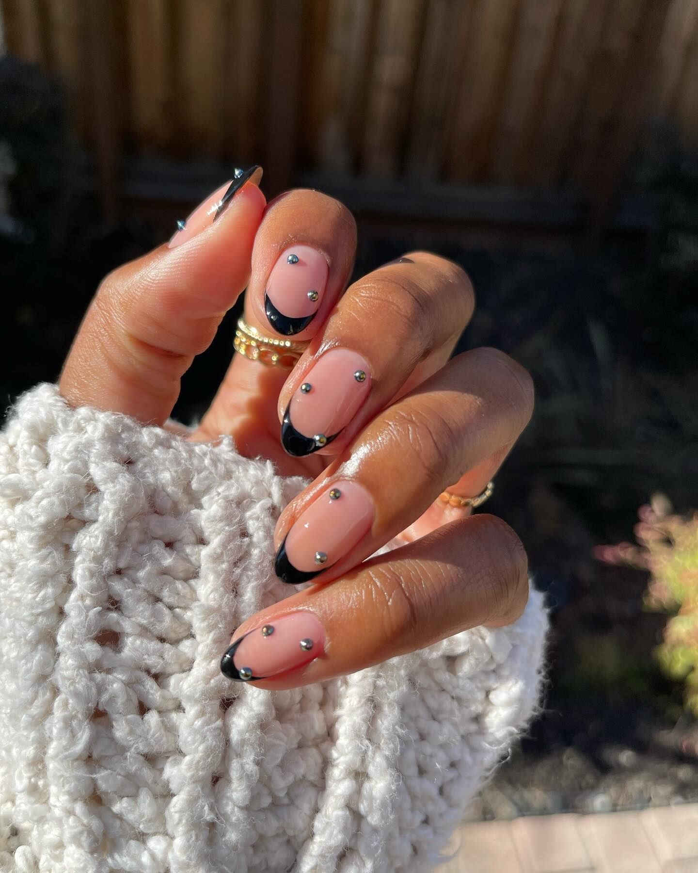 black French manicure with stud detailing
