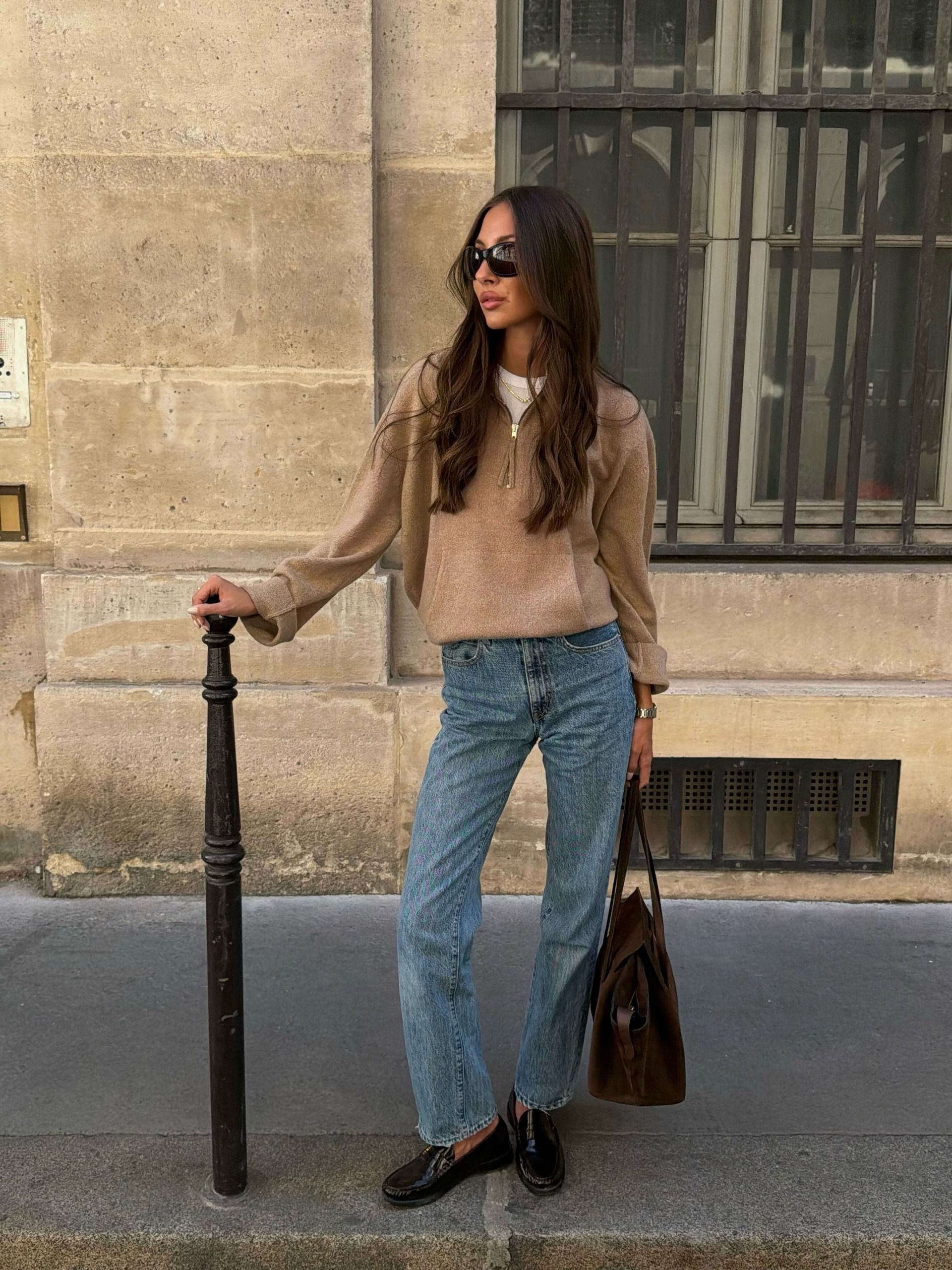 @fakerstrom wearing a sweater and jeans
