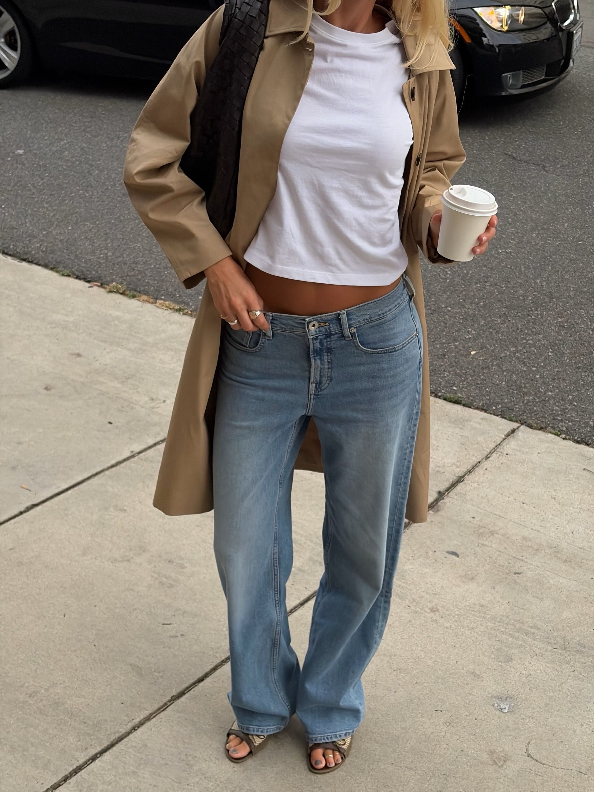 An image of a woman showcasing how to style fall basics 2026