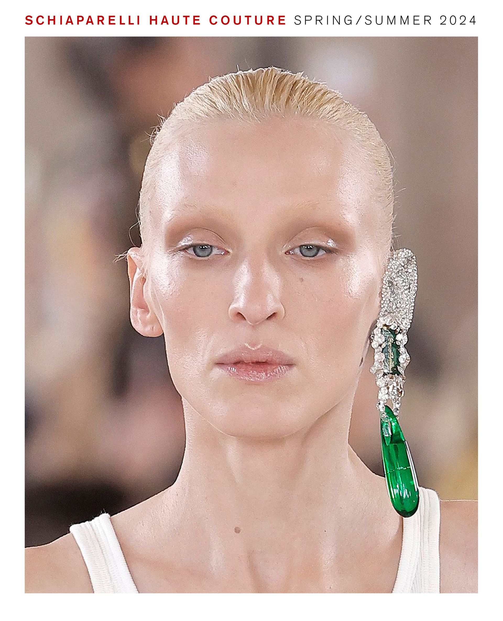 Model wearing Pat McGrath makeup look for Schiaparelli haute couture spring/summer 2024 show.