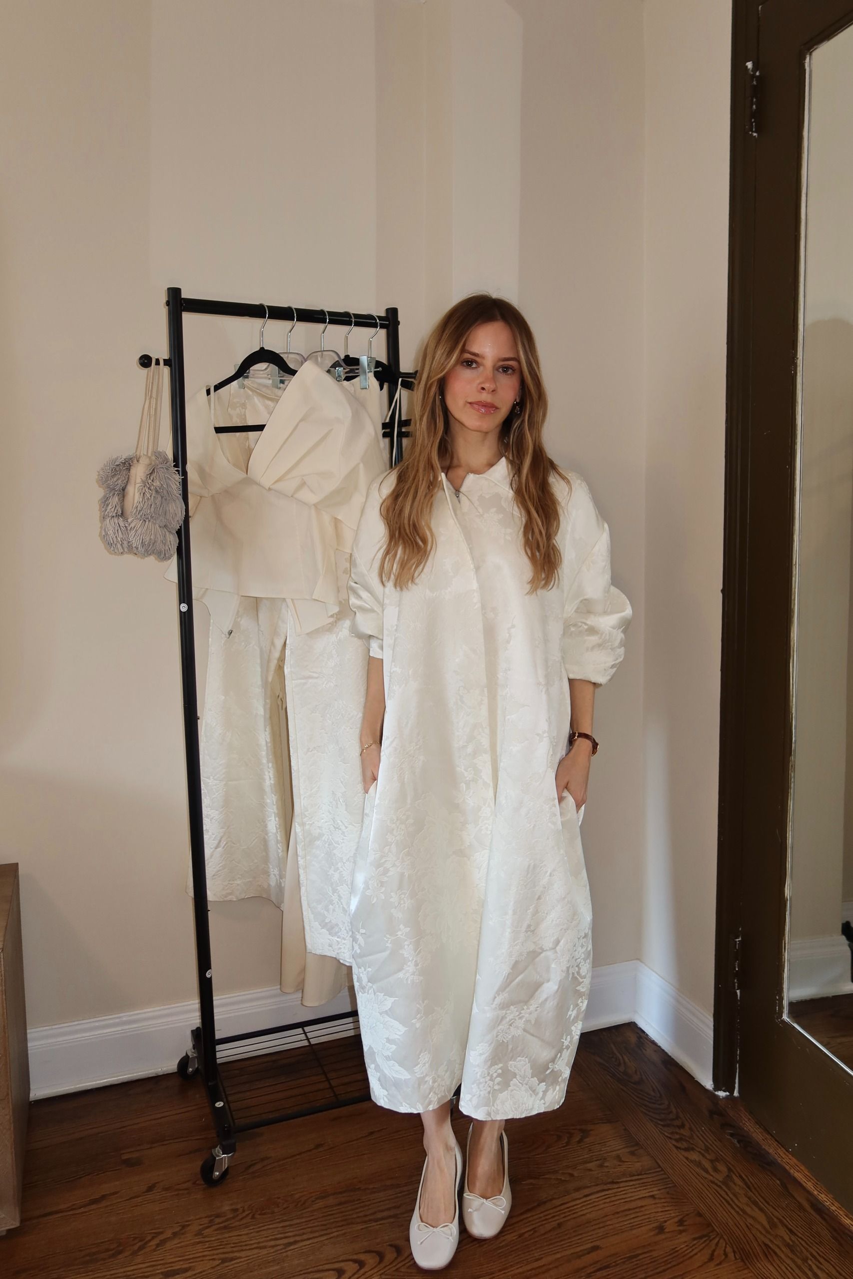nikki tries on a dress from the st. agni bridal edit.