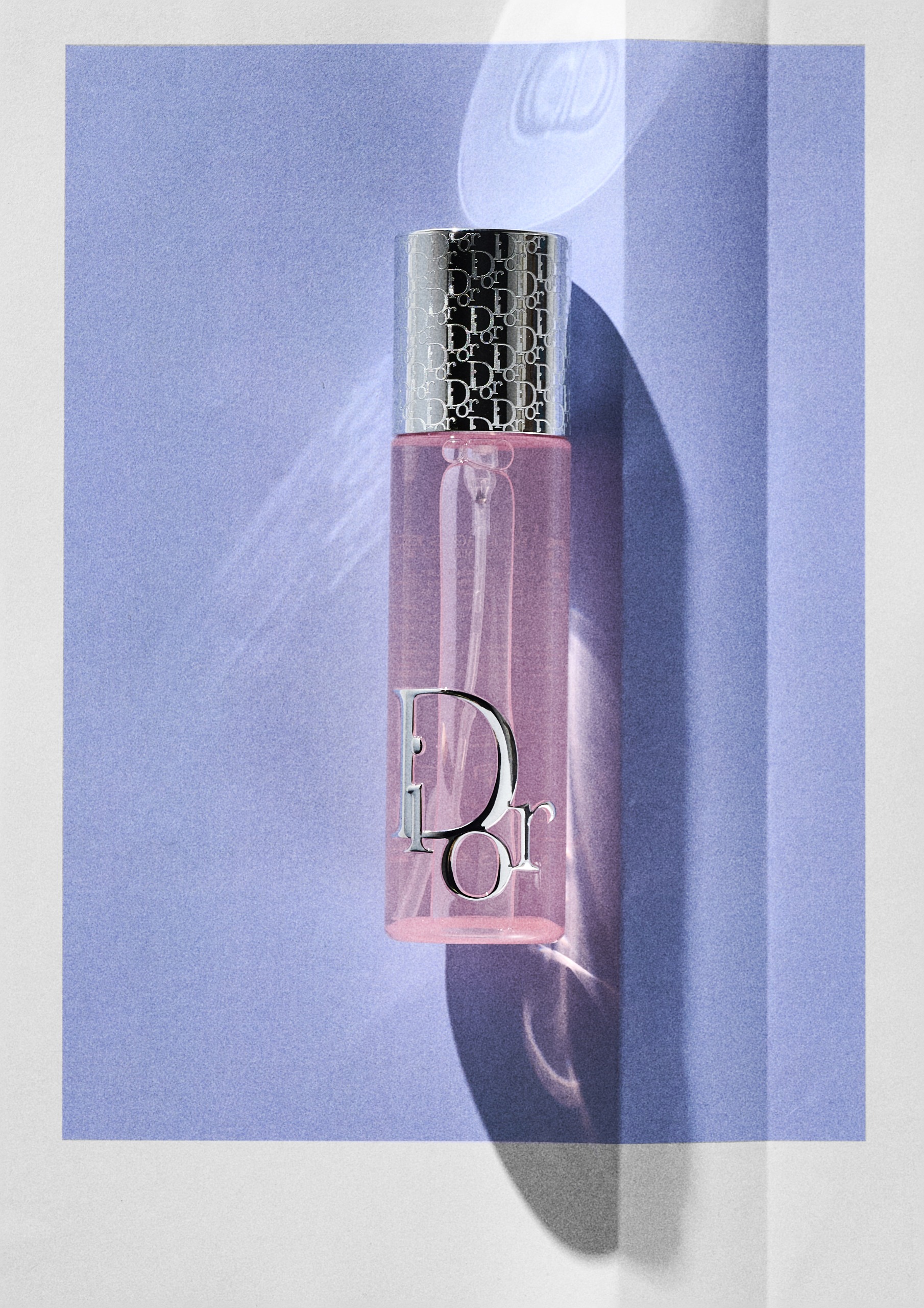 Dior Beauty Backstage Airflash Mist on a blue background