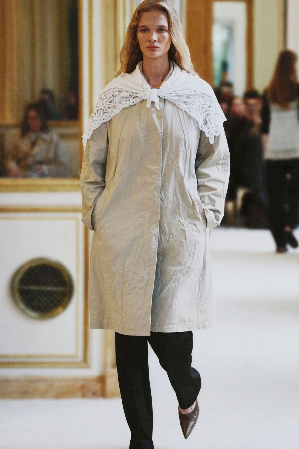 A model walking in The Row's Summer 2027 show during Paris Fashion Week.