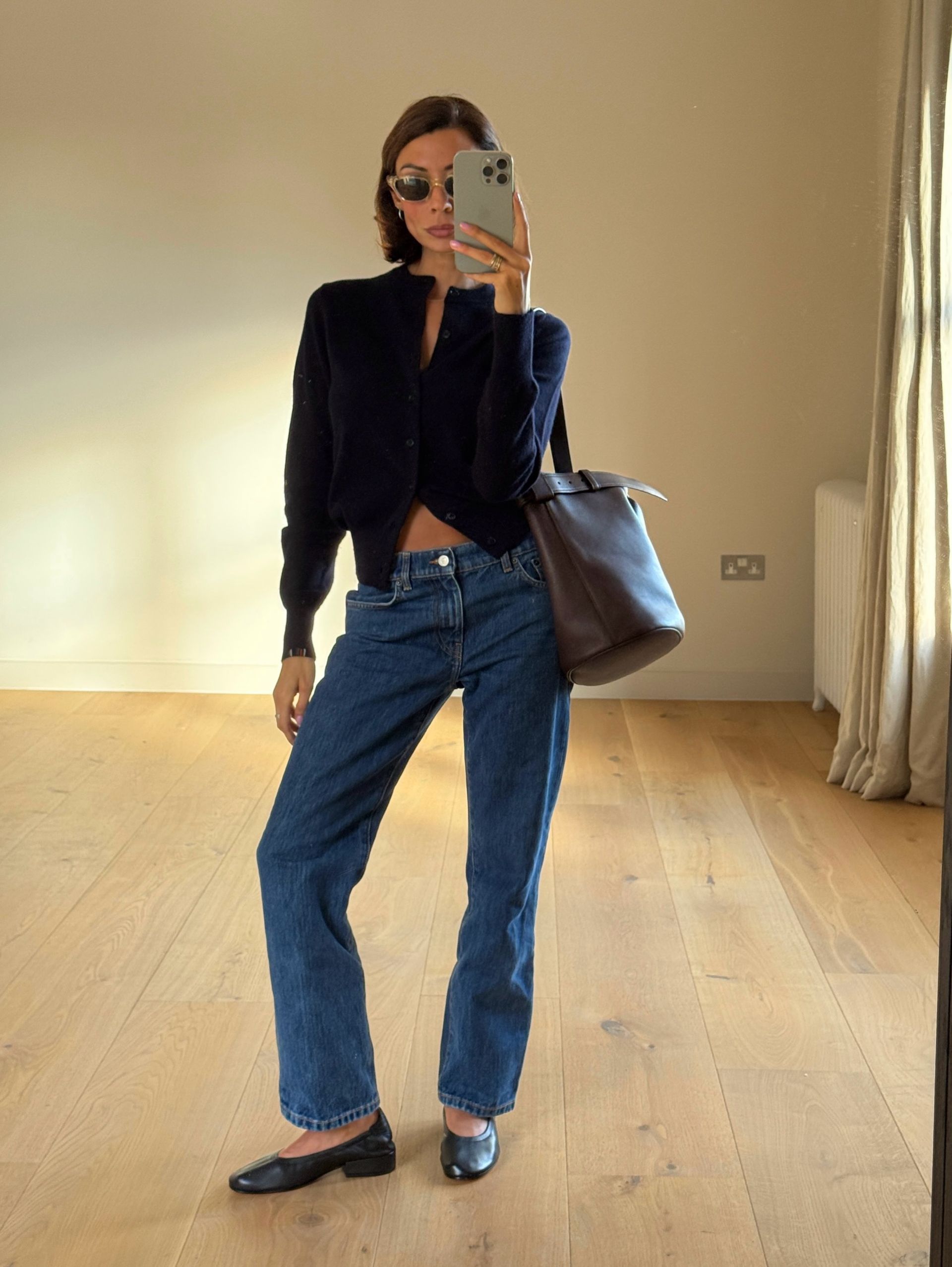 An image of a woman wearing updated fall outfit 2026